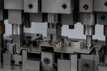Single-Step Multi-Angle Bending of Shielding Frames: Process Integration and Springback Control